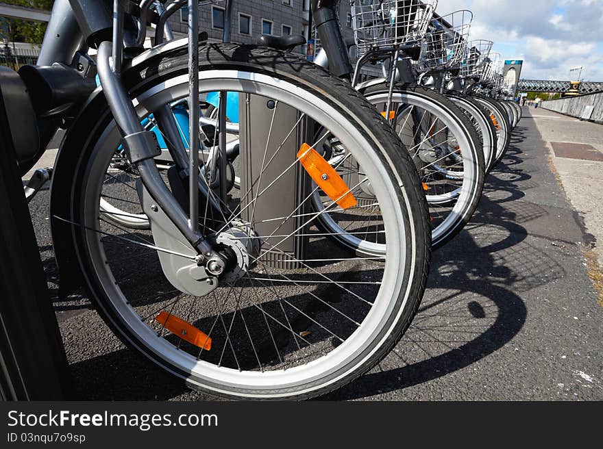 Row of City Bikes for rent at the parking in Dublin. Row of City Bikes for rent at the parking in Dublin