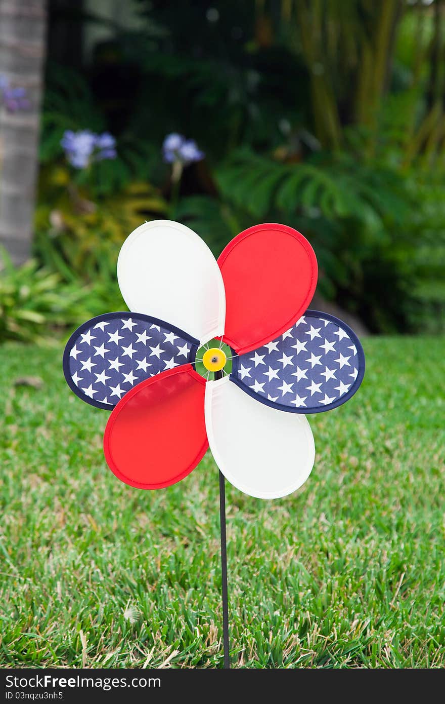 Pinwheel with the U.S. symbol on green grass