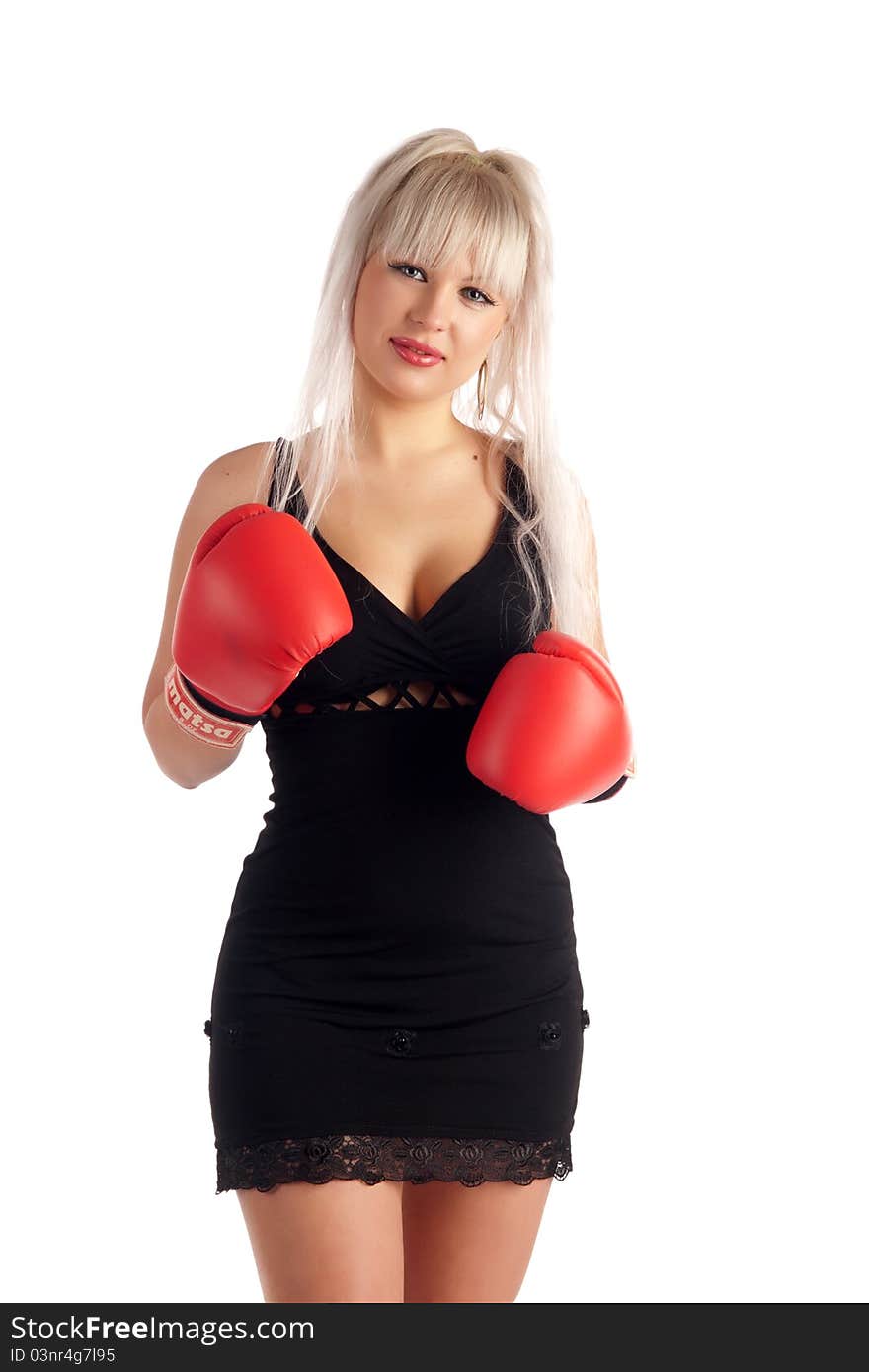 Stylish, glamour girl In boxing gloves on a white background, looks at you