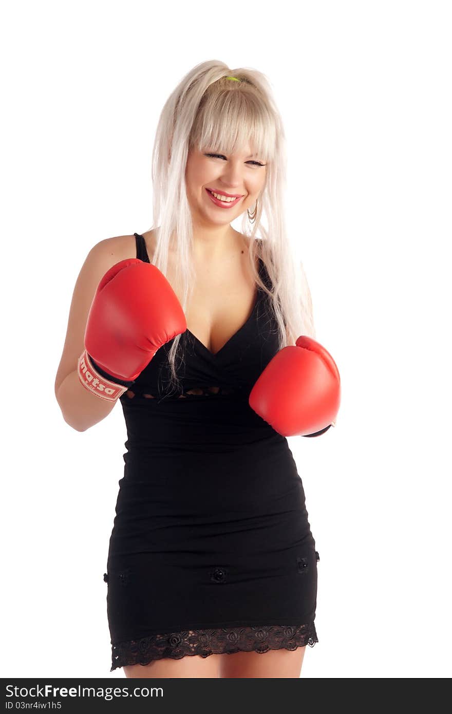 Stylish, glamour girl In boxing gloves on a white background, looks at you