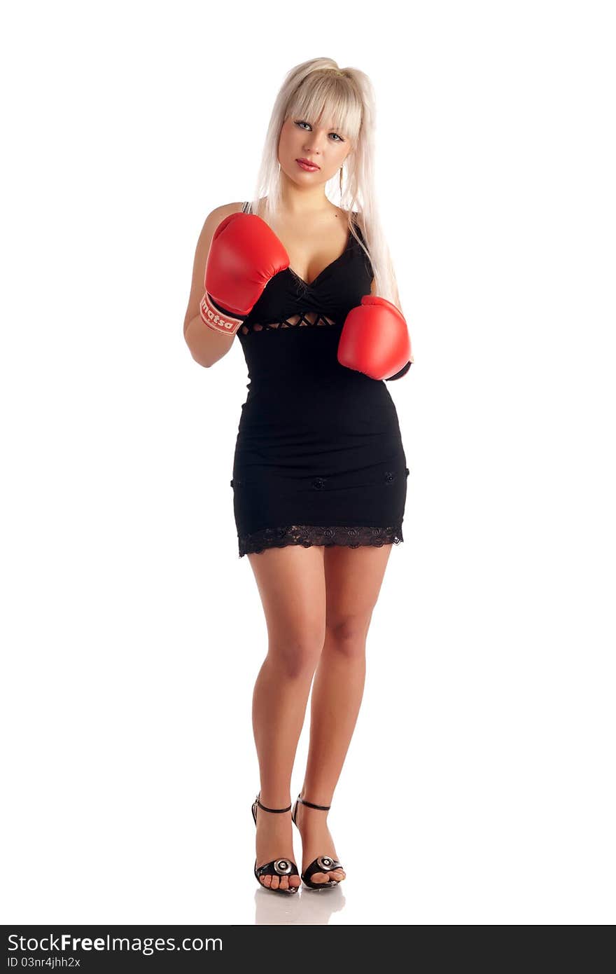 Stylish, glamour girl In boxing gloves on a white background, looks at you