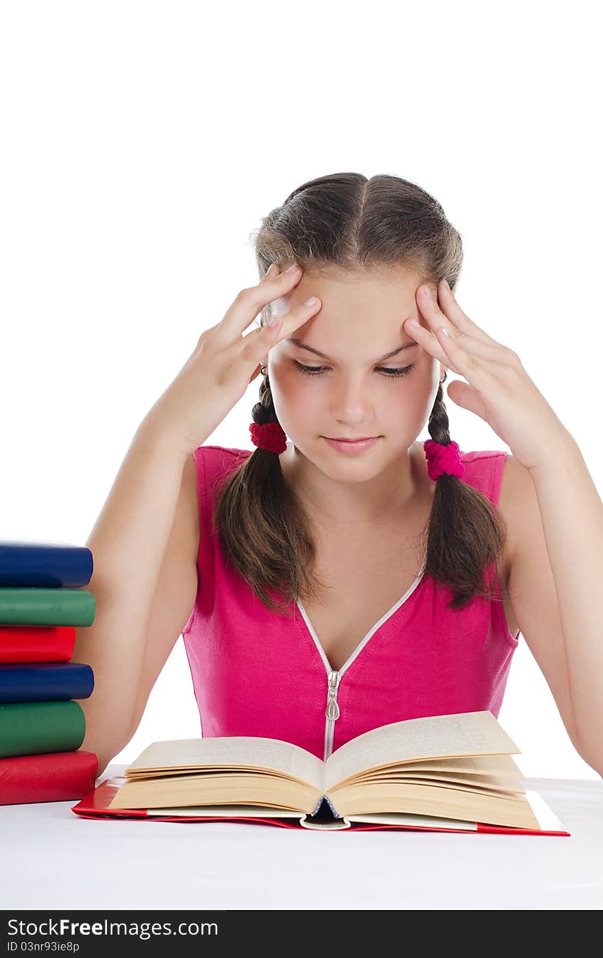 Portrait of the young girl with books