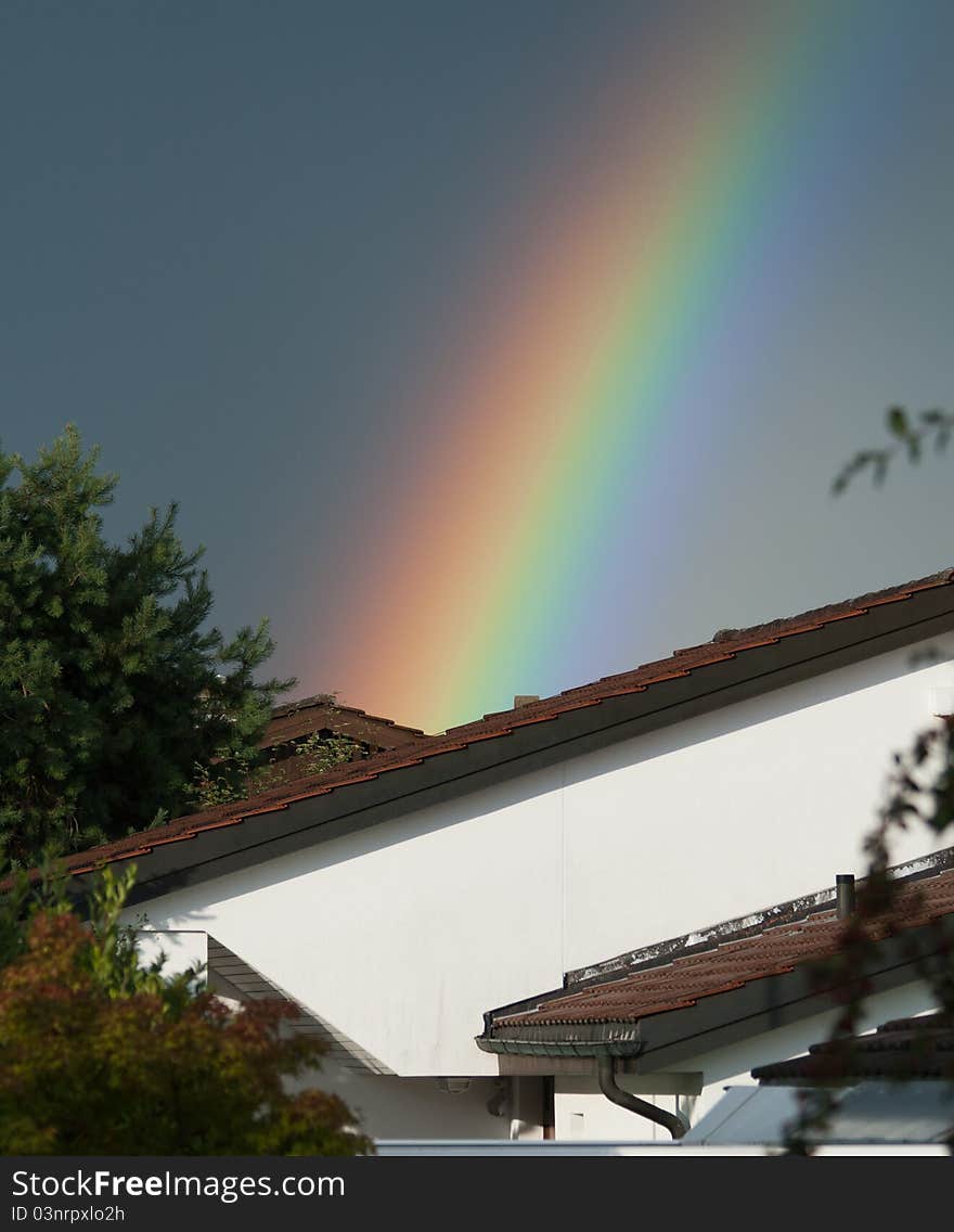 Fading Rainbow over a house