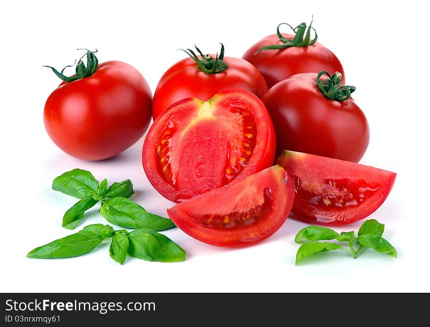 Red tomatoes with basil