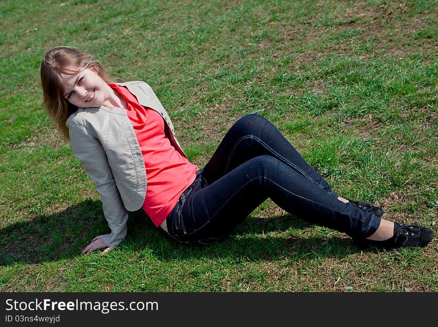 Girl sitting on the grass