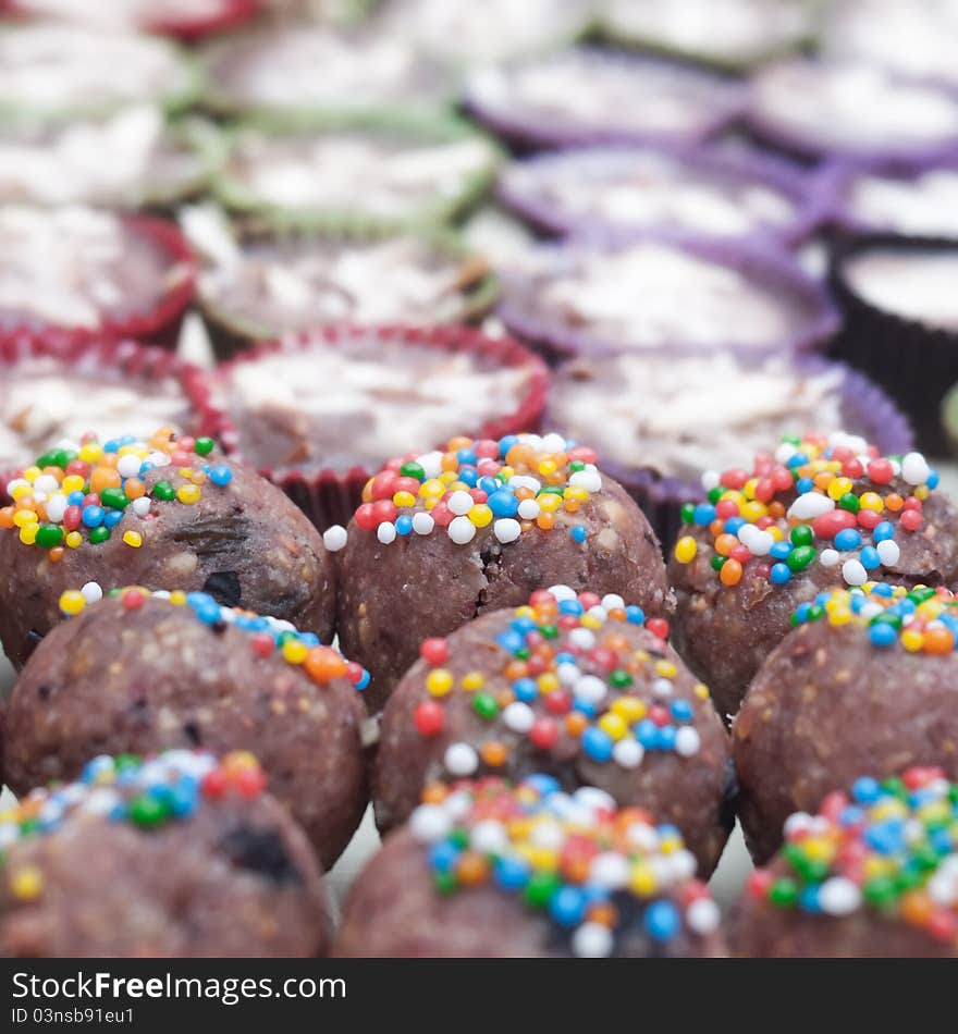 Background filled with colorful cakes and desserts,shallow depth of field