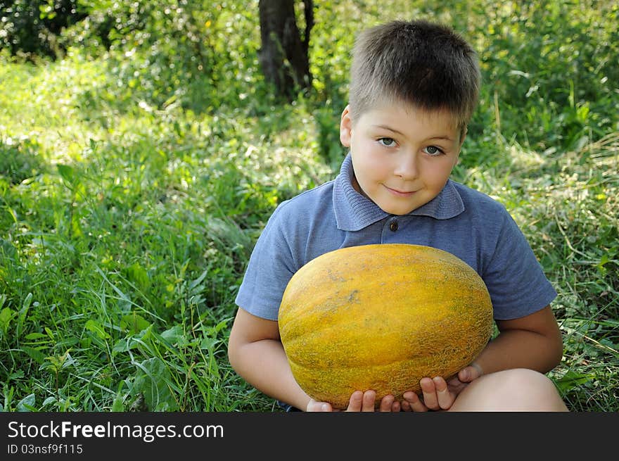 A Boy With A Large Melon