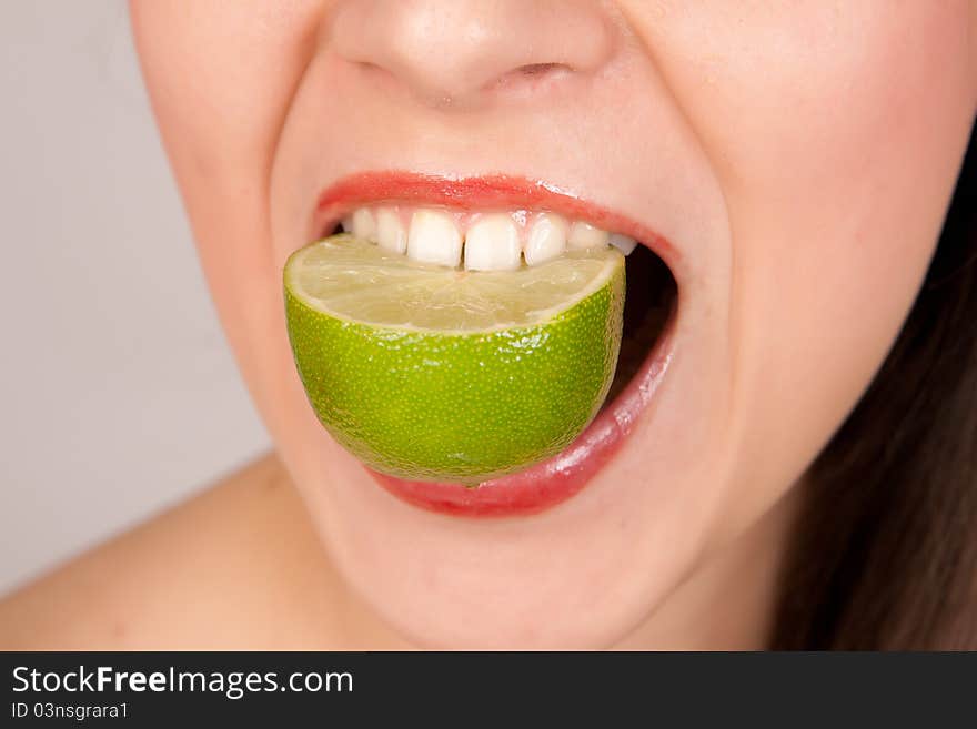 Girl Biting Lime