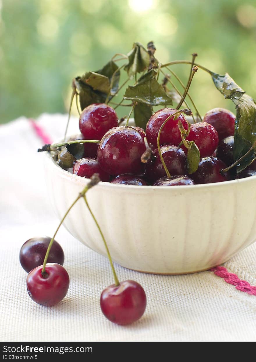 Beautiful fresh cherry in a bowl. Selective focus