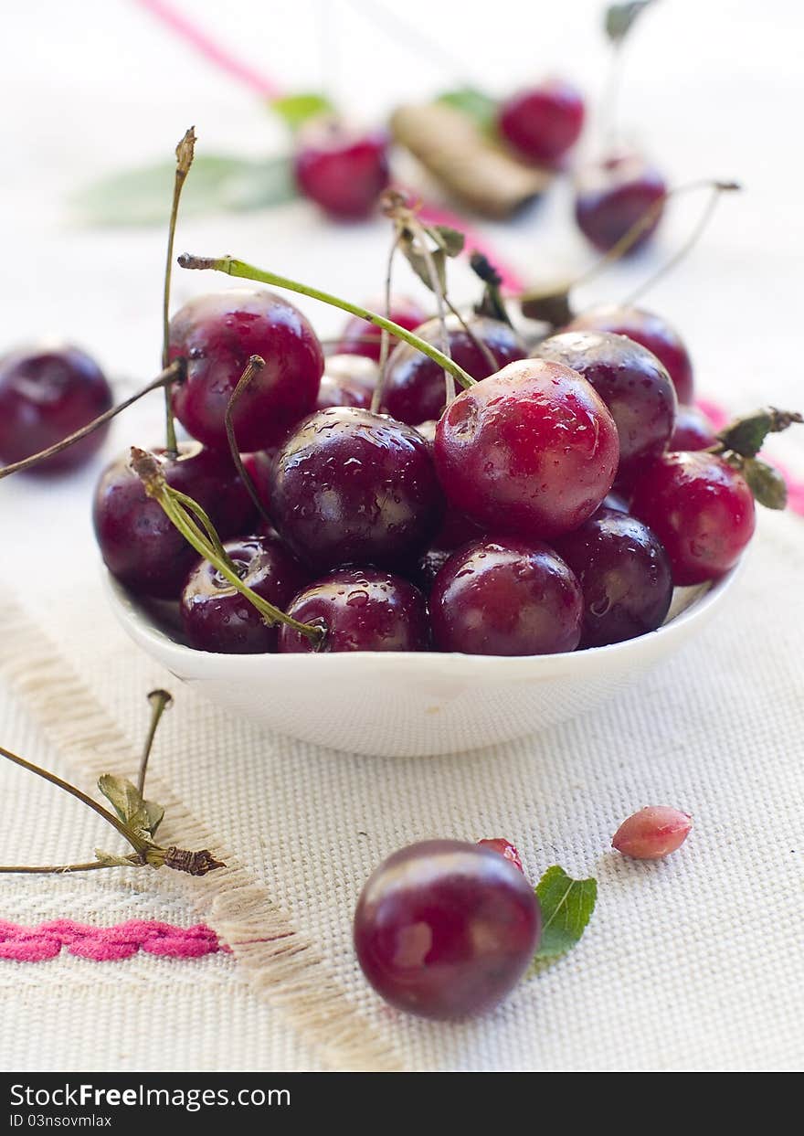 Beautiful fresh cherry in a bowl. Selective focus