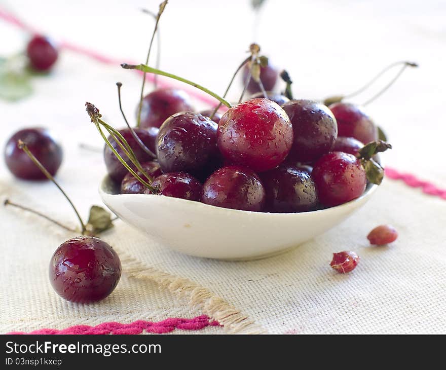 Beautiful fresh cherry in a bowl. Selective focus