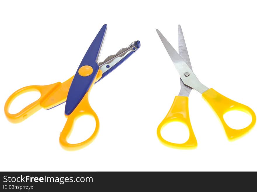 Scissors on the white background