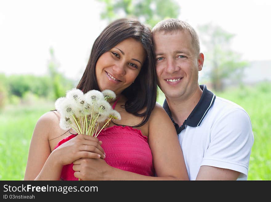 Young couple in the park portrait