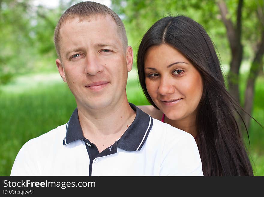 Young couple in the park portrait