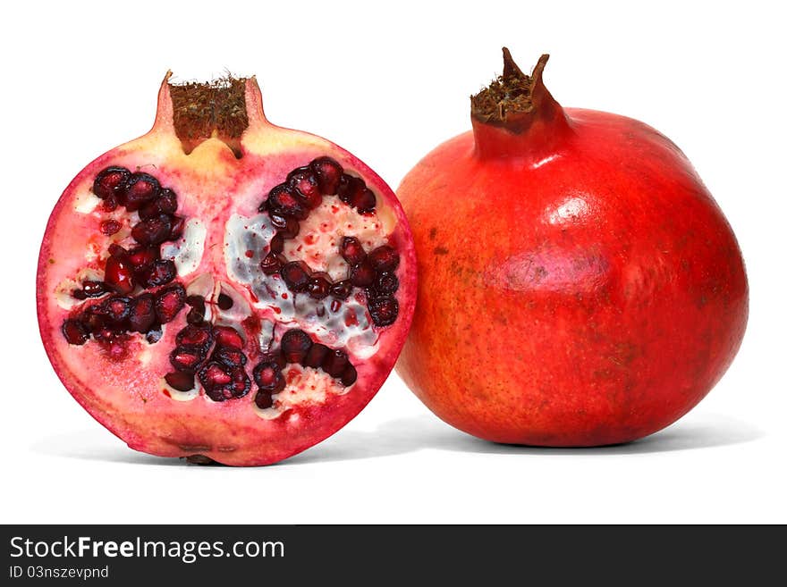 Pomegranate over white background with shadow