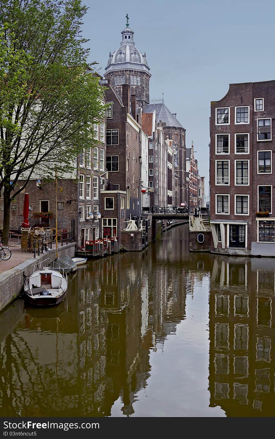 View of the morning canal street in Amsterdam. View of the morning canal street in Amsterdam