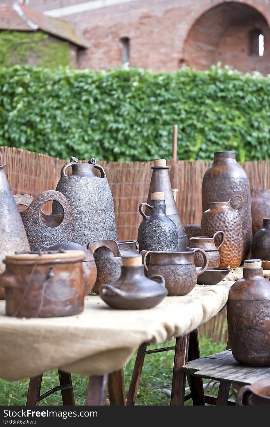 Traditional ceramics exposed on the street market of the Teutonic Order castle in Malbork (Poland). Traditional ceramics exposed on the street market of the Teutonic Order castle in Malbork (Poland).