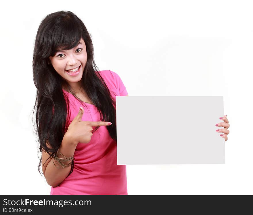 Woman pointing at a blank board isolated over white background