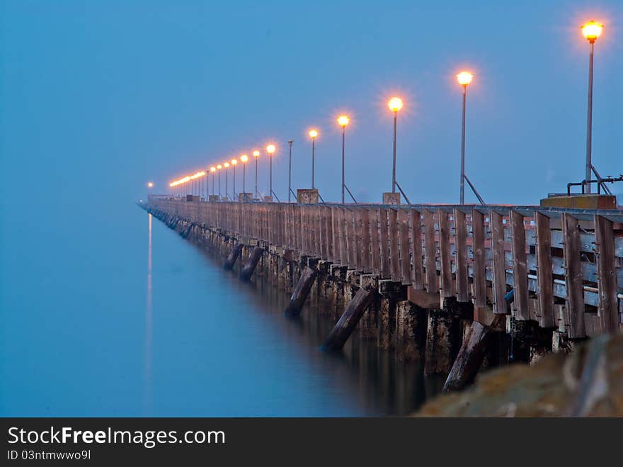 Pier in the morning mist