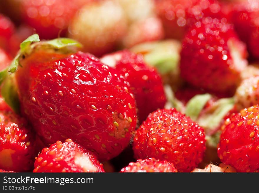 Macro view of a heap of fresh strawberries