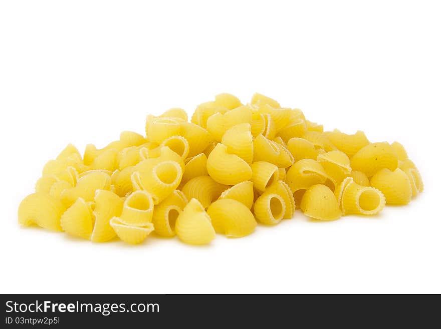 Uncooked macaroni isolated on white background. Uncooked macaroni isolated on white background