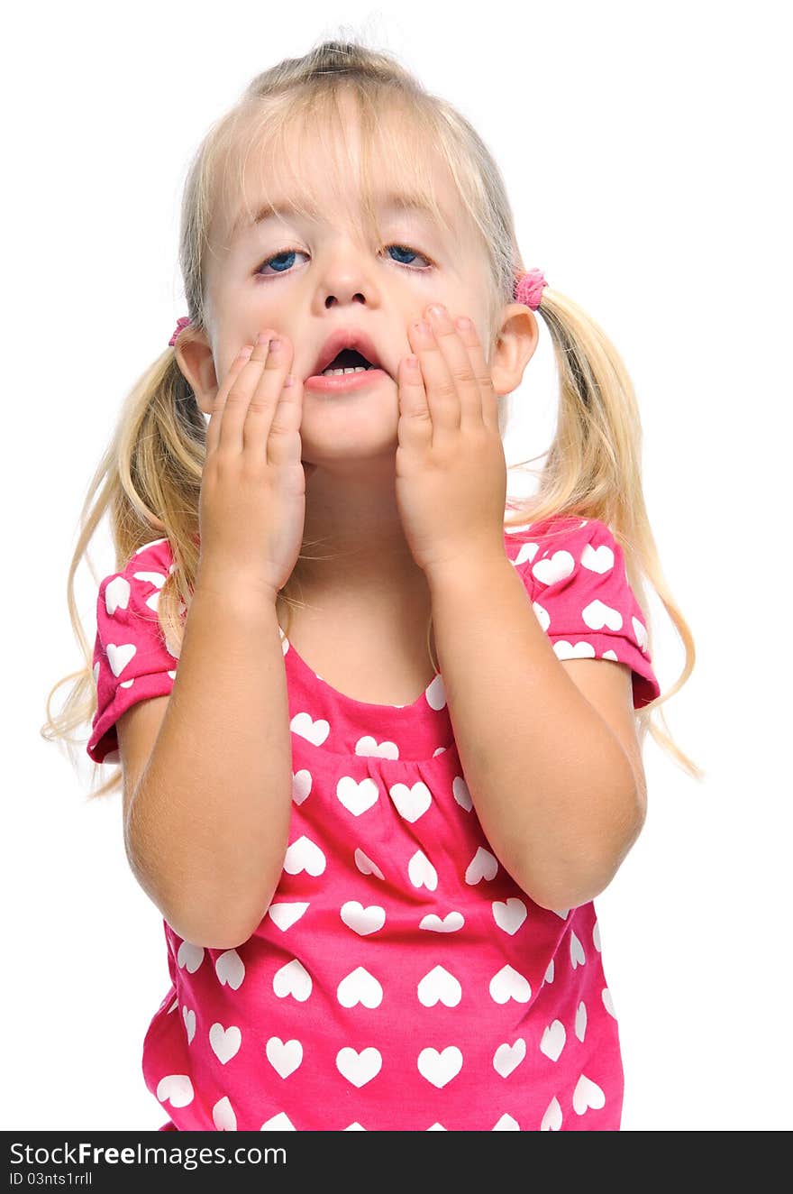 Pulling faces girl with blonde hair and pink top isolated on white. Pulling faces girl with blonde hair and pink top isolated on white