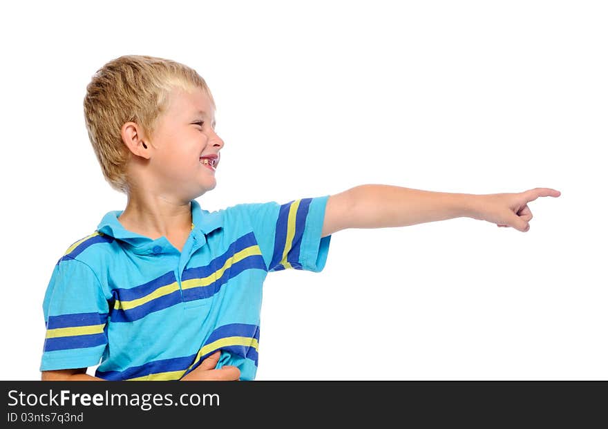 Cute boy in blue shirt pointing at something off frame. Cute boy in blue shirt pointing at something off frame