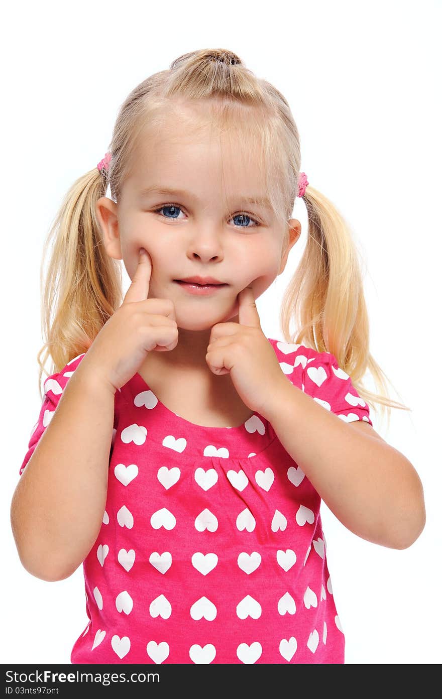 Little girl with chubby cheeks pushes her face, isolated on white. Little girl with chubby cheeks pushes her face, isolated on white