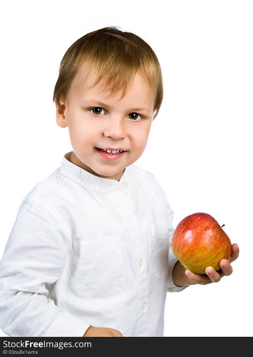 Little boy with apple isolated on white background