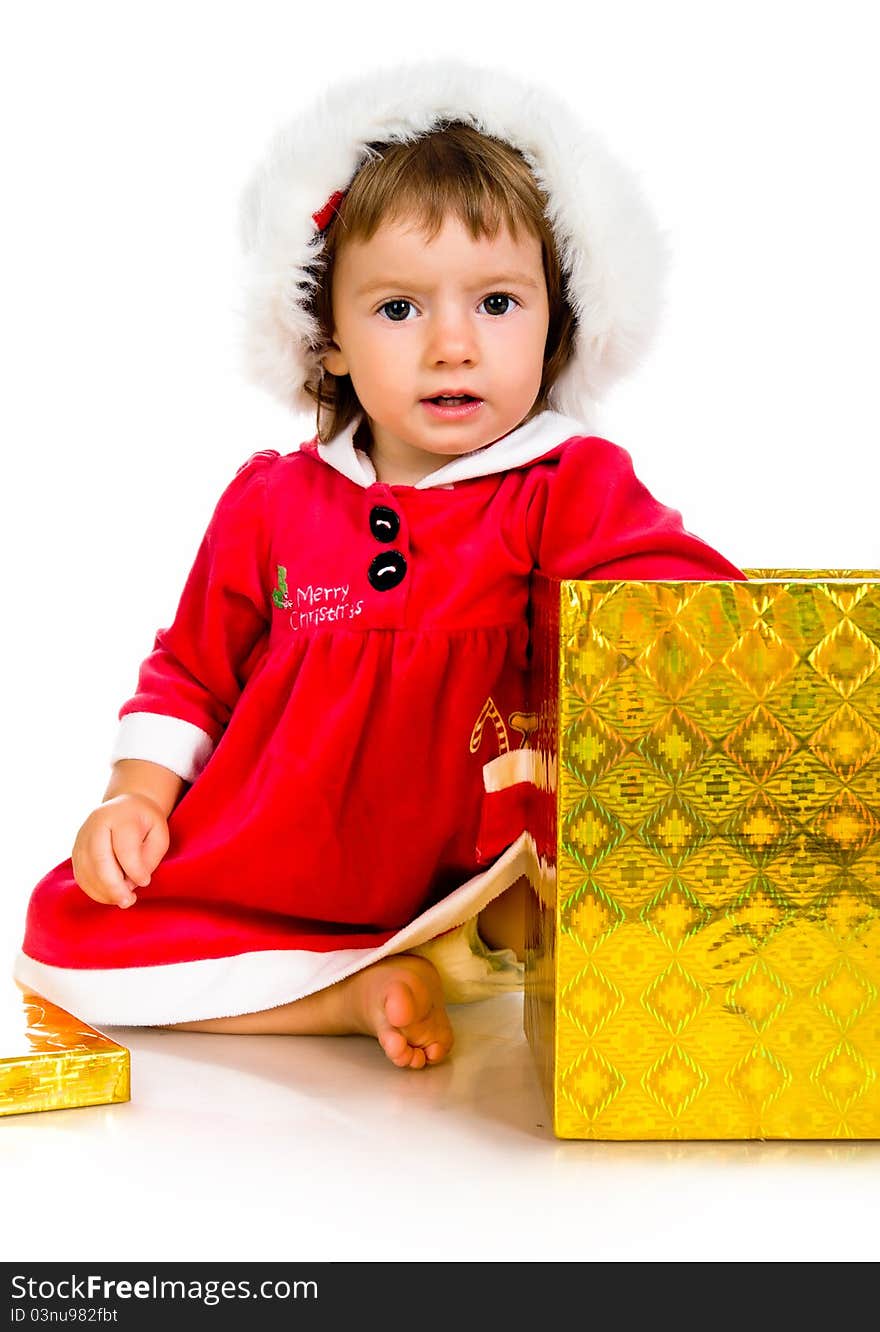 Little Girl In Santa Hat With Presents