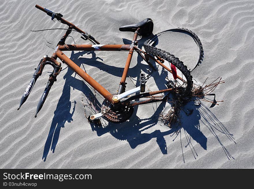 Bicycle rusting at the beach. Bicycle rusting at the beach.