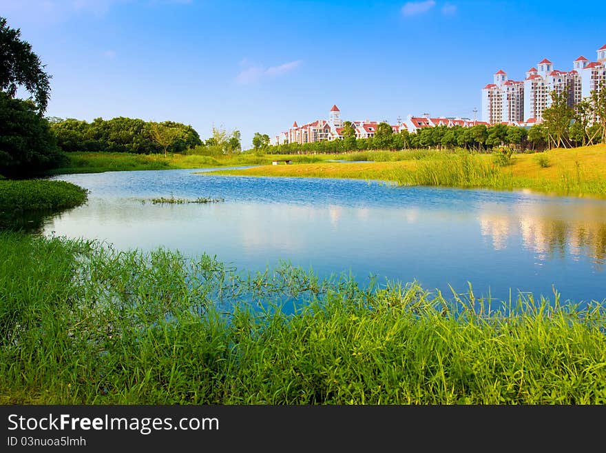 Residential, lake, lawn, and beautiful environment. Residential, lake, lawn, and beautiful environment