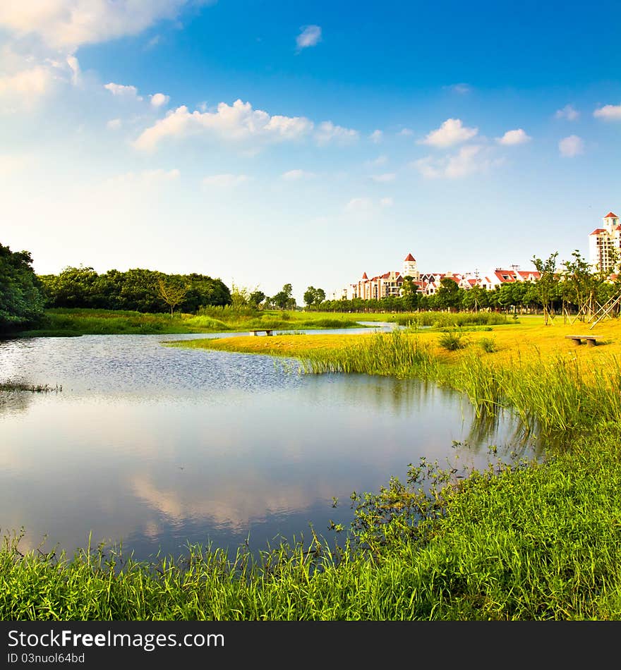 Residential, lake, lawn, and beautiful environment. Residential, lake, lawn, and beautiful environment