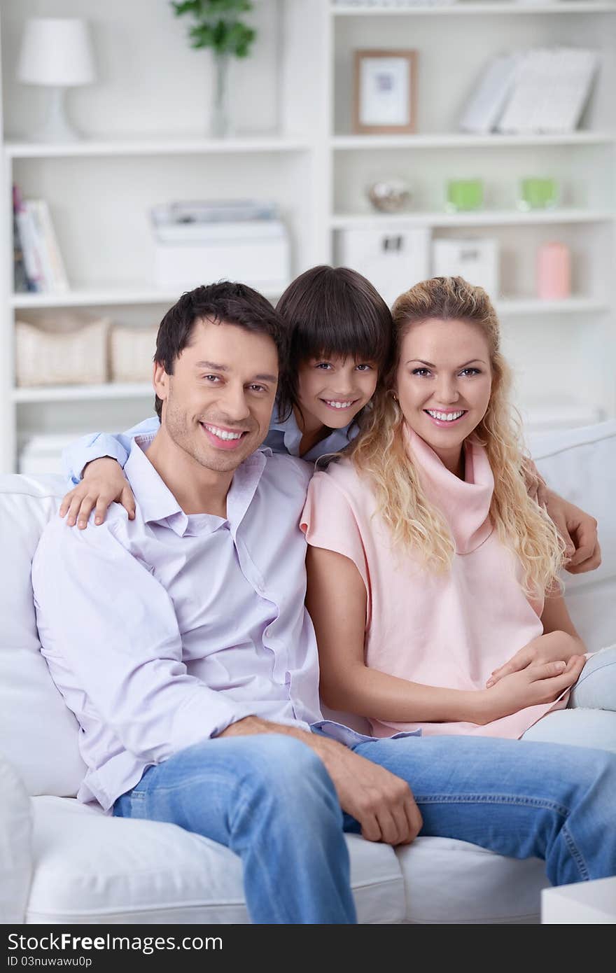 A happy family with a child at home. A happy family with a child at home