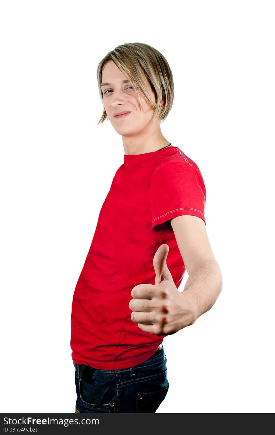 Happy young man holding a finger up