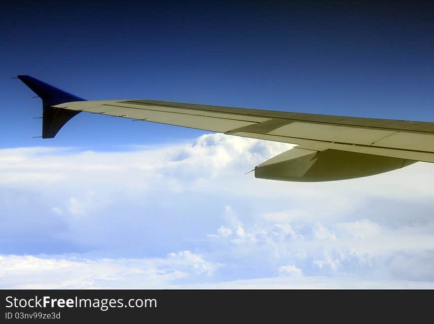 The wing against the backdrop of the beautiful sky