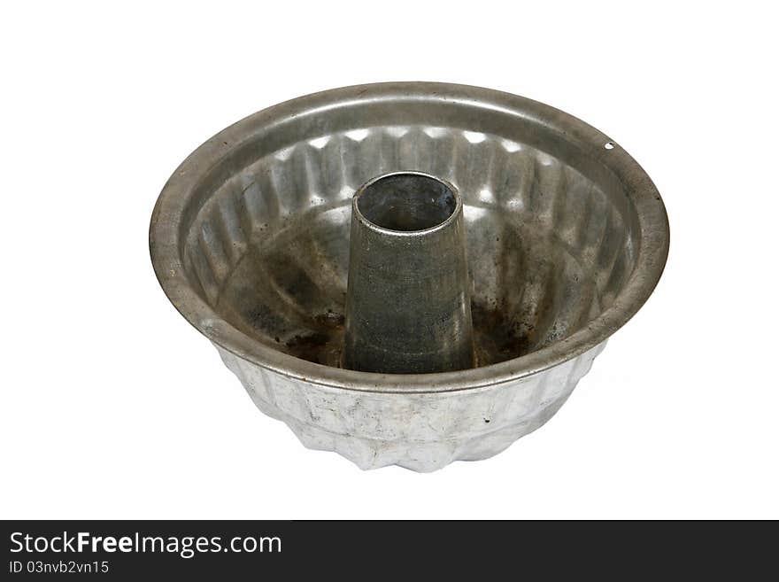 Vintage cake baking tin isolated on a white background