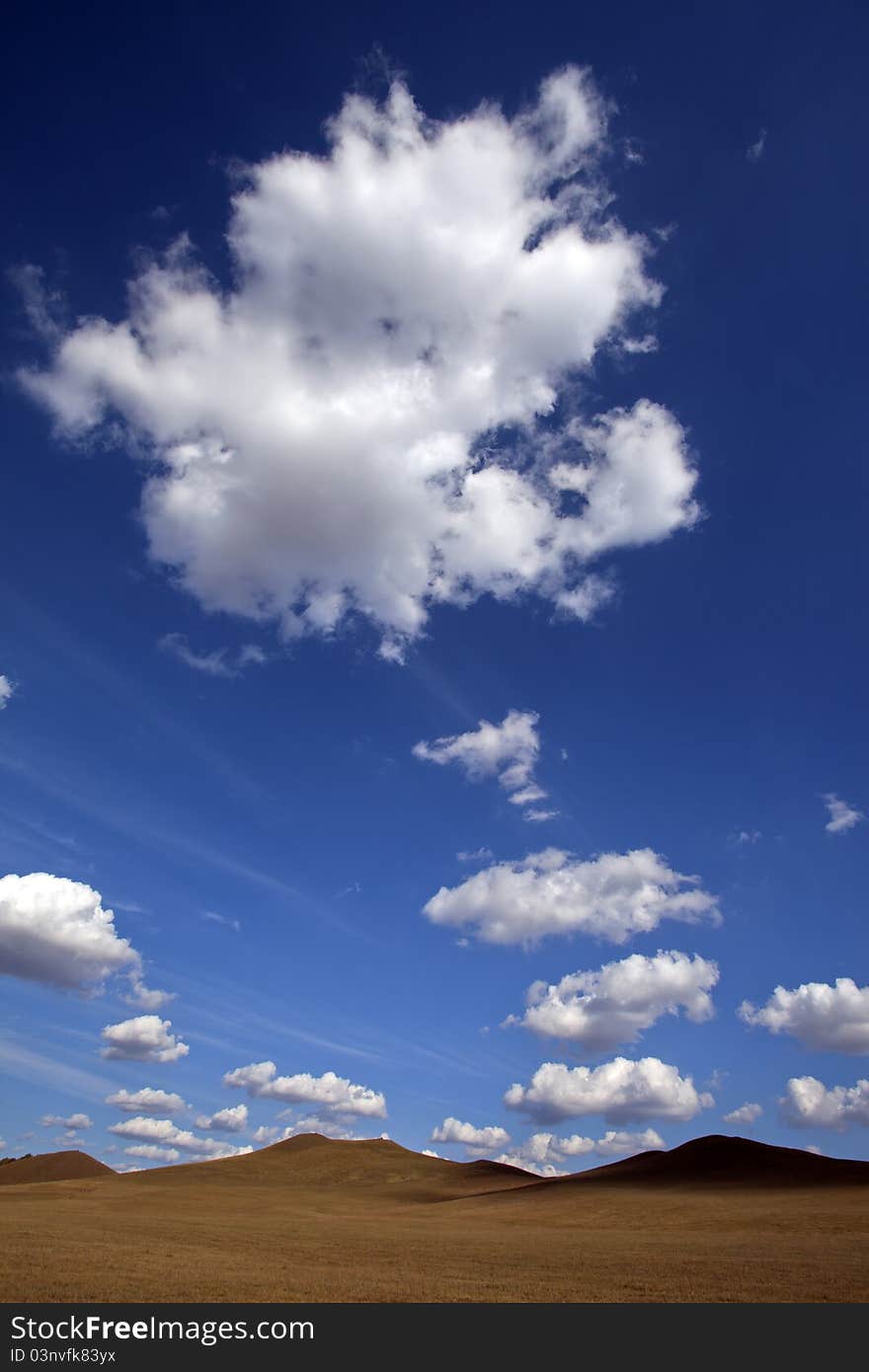 Meadow meets sky in Bashang