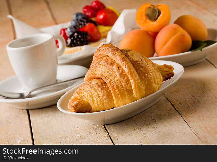 Photo of delicious tasty breakfast food on wooden table