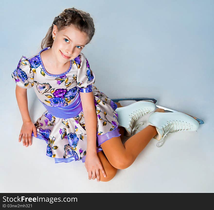 Girl on skates isolated on a white background