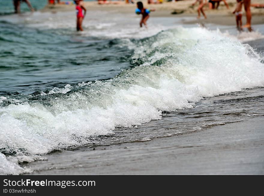 Summer vacation on beach sea shore.people relaxing by sea