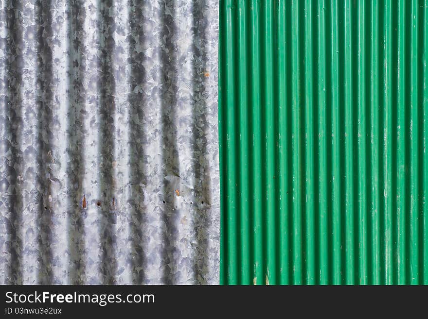 Gray and green corrugated iron's wall. Gray and green corrugated iron's wall