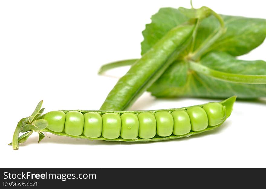 Fresh green pea pod and peas on white background. Fresh green pea pod and peas on white background.