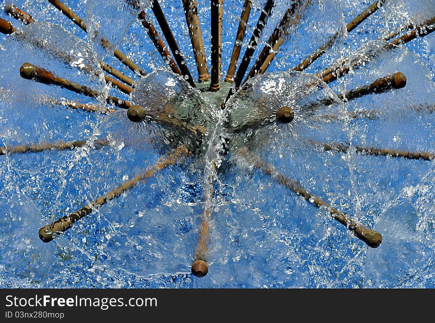 Closeup Of A Water Fountain With Abstract Water Pattern. Closeup Of A Water Fountain With Abstract Water Pattern