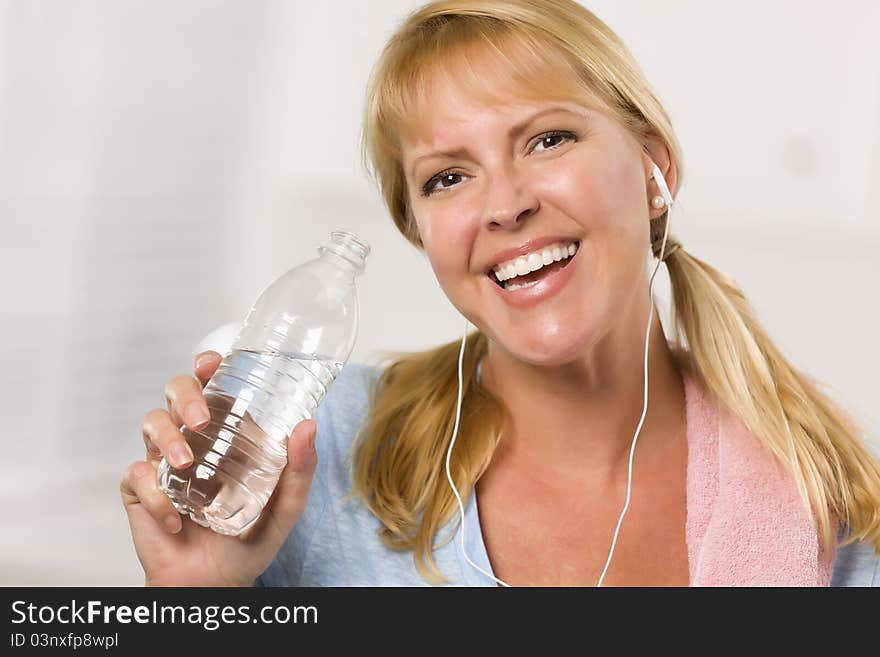 Pretty Blonde With Towel Drinking Water Bottle