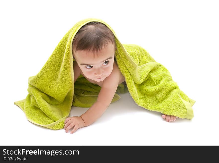 Beautiful baby with a towel over your head. Beautiful baby with a towel over your head