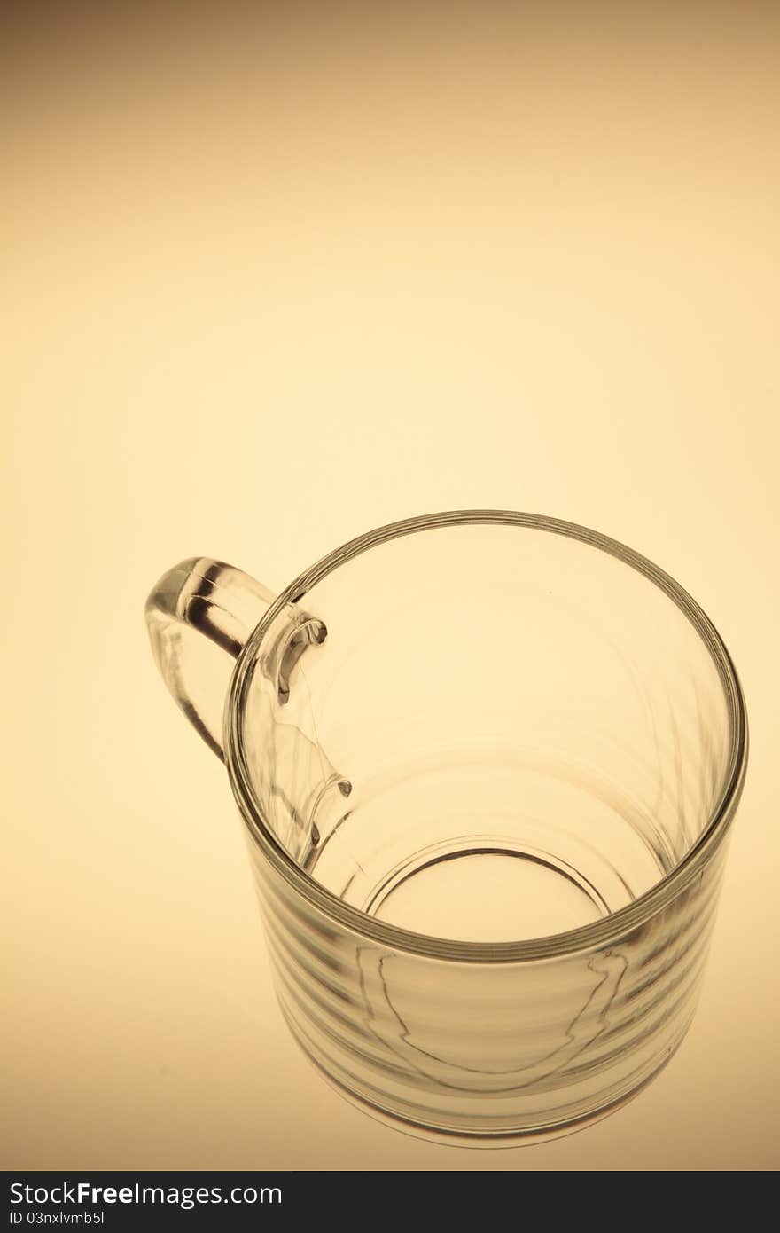 A glass cup with white background.