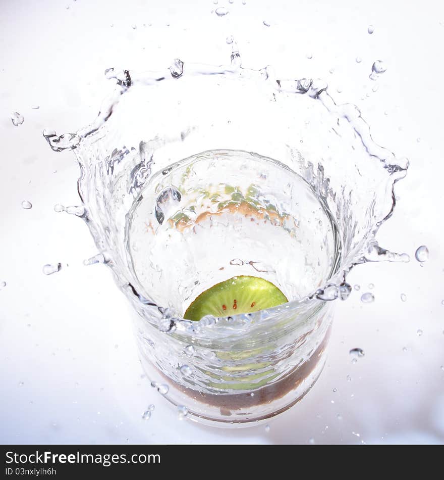 A Fruit drop in water. A Fruit drop in water.