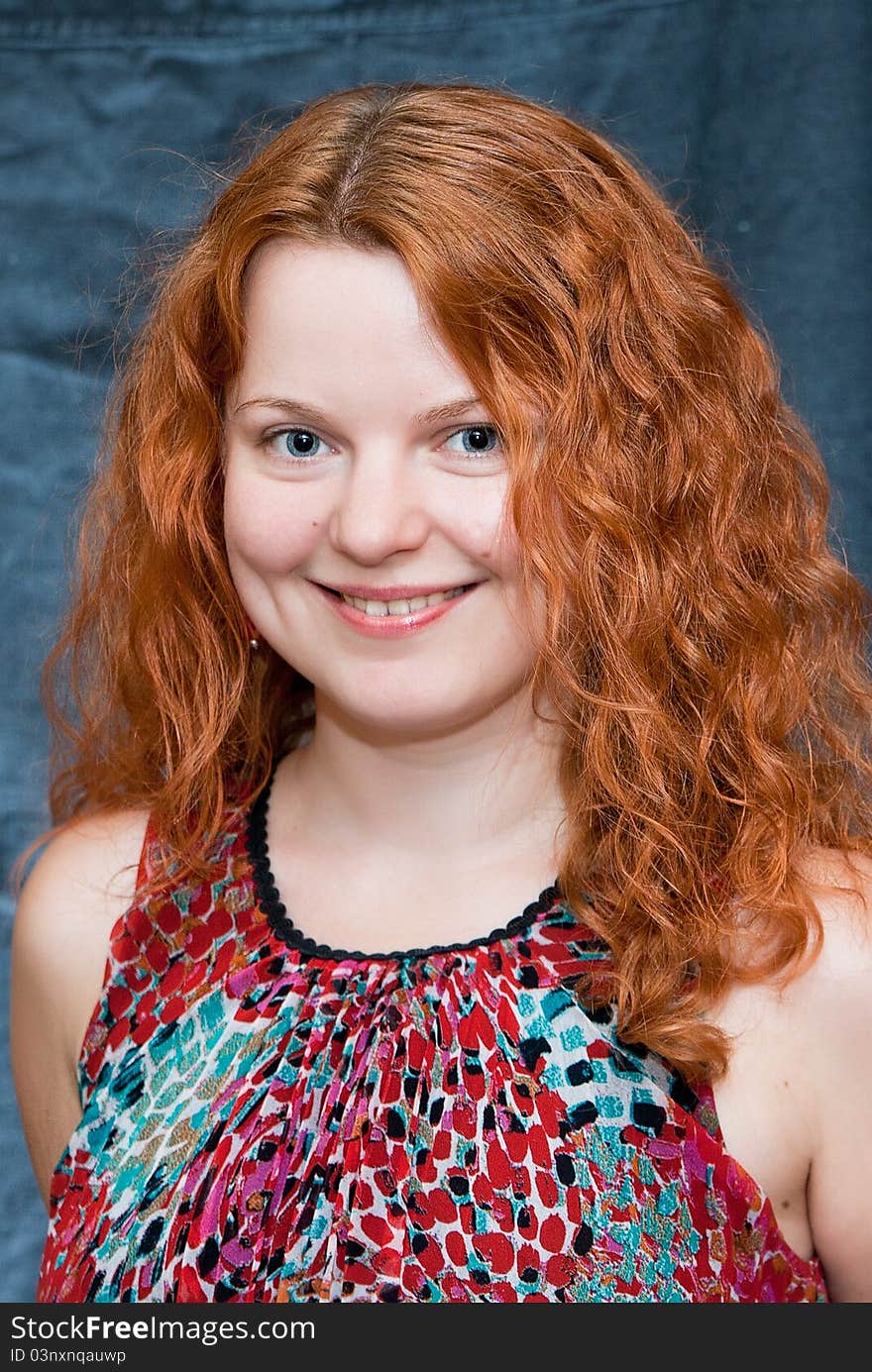 Pretty girl smiling with red hair