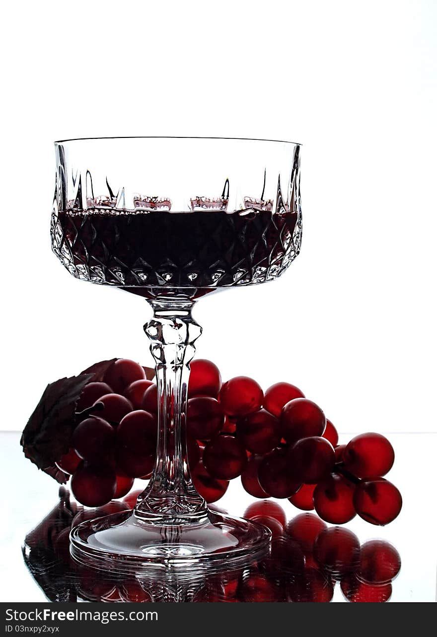 Abstract wine glassware background design with grapes. Abstract wine glassware background design with grapes.